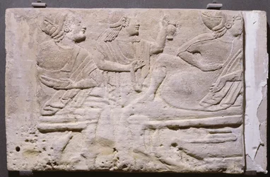 Cippi showing a banquet